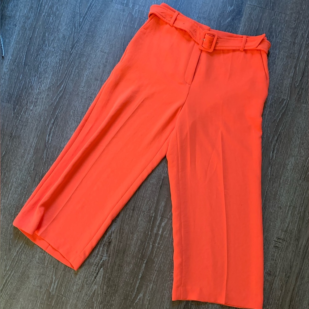 Bright orange trousers